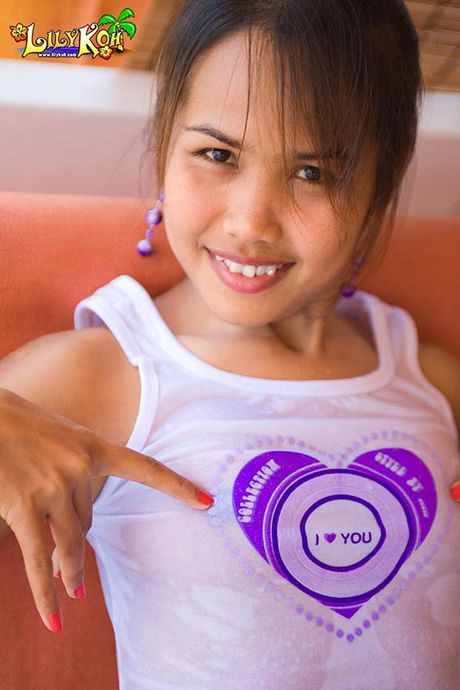 Asian Lily rubs wet pussy then exposes tiny dark nipples